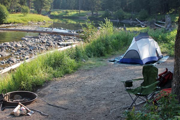 Tent and camp chair at campsite - NPS
